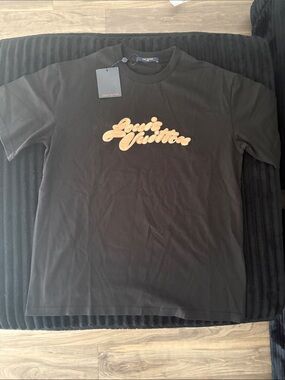 Louis Vuitton Men's Black Tee with Gold Script Logo